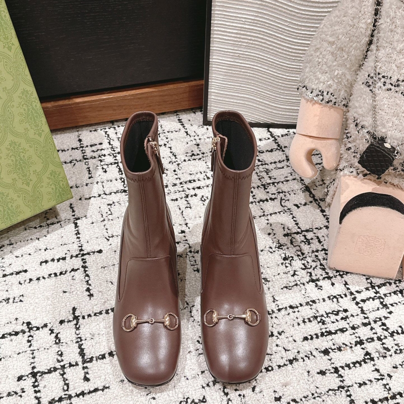 G*u*i boots